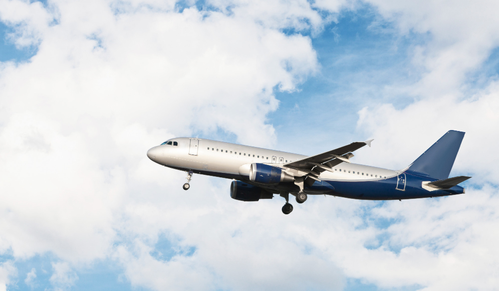 airplane-flying-cloudy-sky.jpg airplane-flying-cloudy-sky.jpg